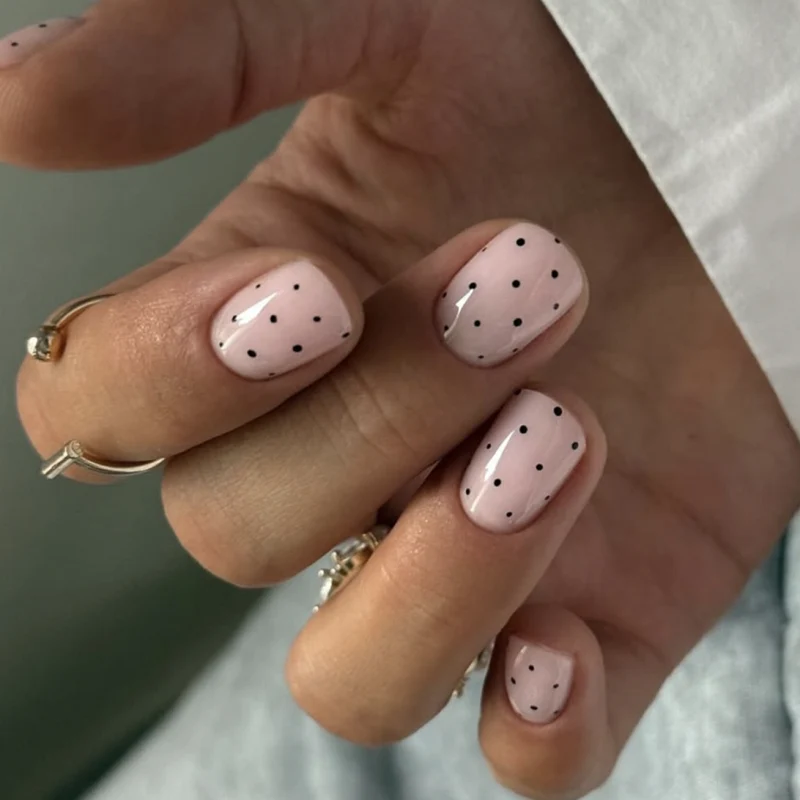 Artful Nail Art with Modern Dot Patterns Stornfield