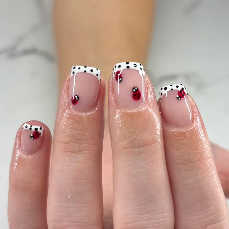 Artistic nail art with ladybug designs Stornfield