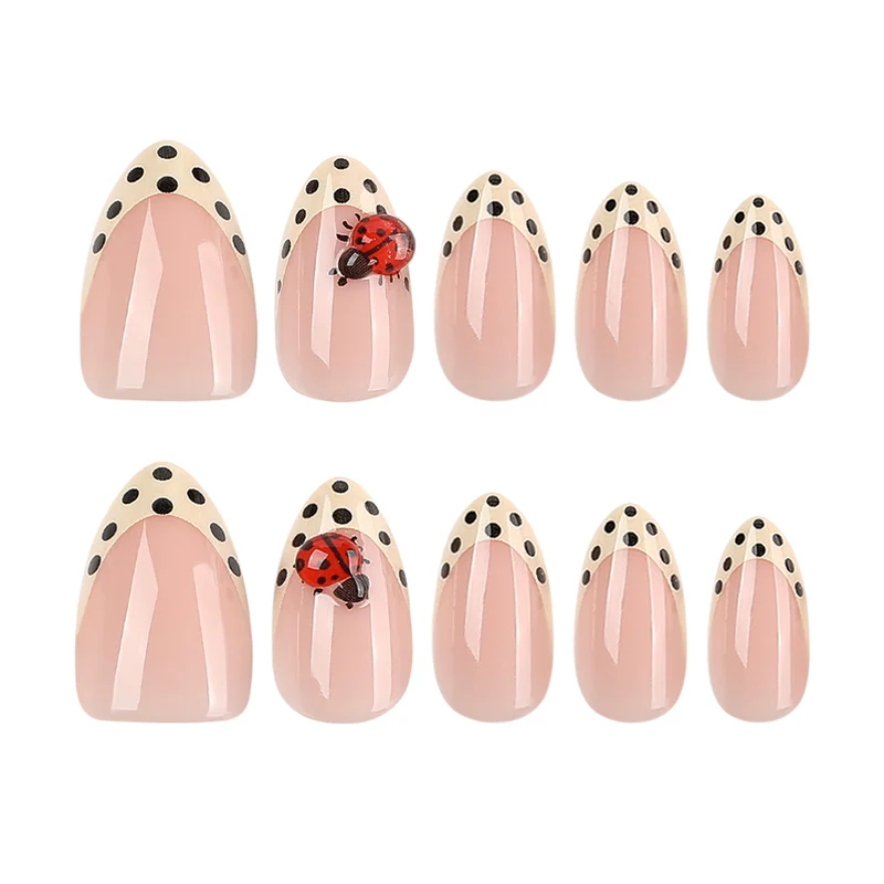 Artful nail art with ladybug motif and polka dots Stornfield