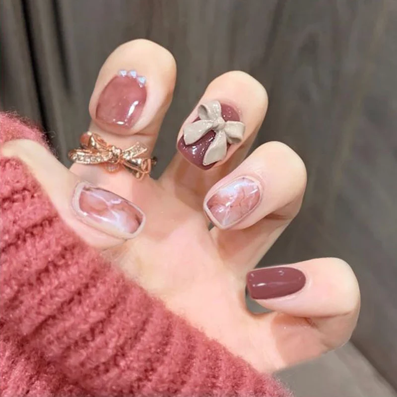 Artful nail art with luxurious 3D bows and elegant accents Stornfield