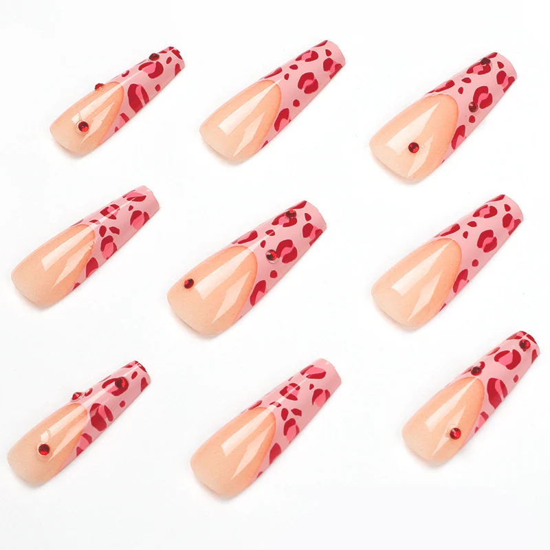 Artful nail art with leopard pattern and glitter accents Stornfield