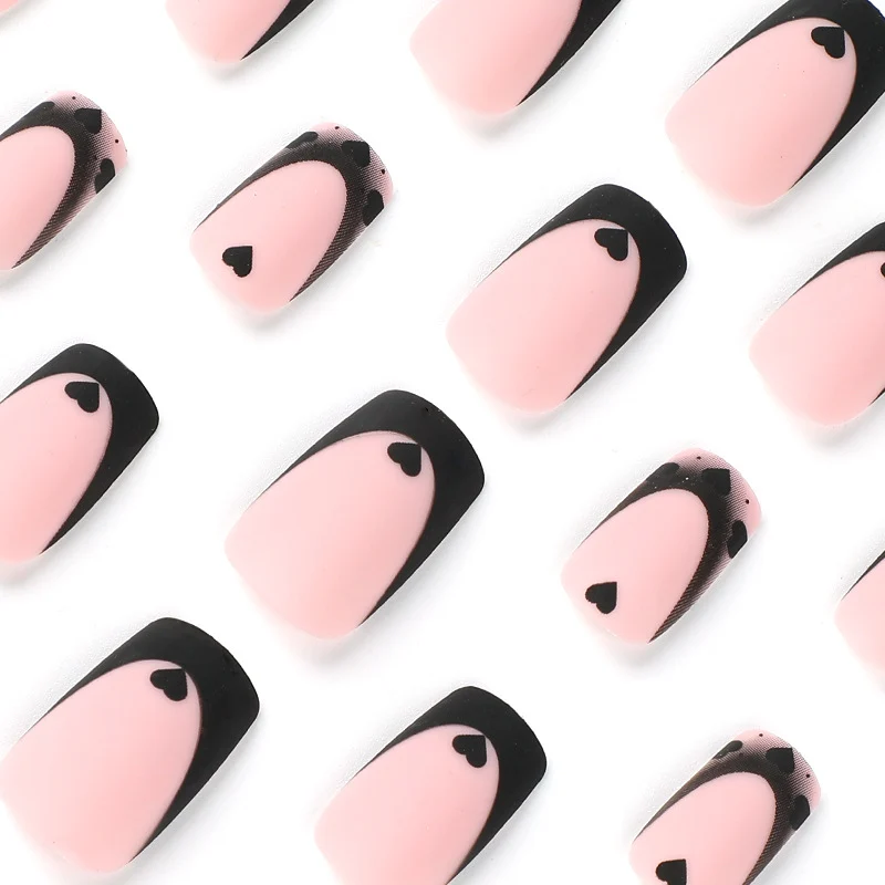 Artful Nail Art with Heart Motifs and Black-White Lace Stornfield