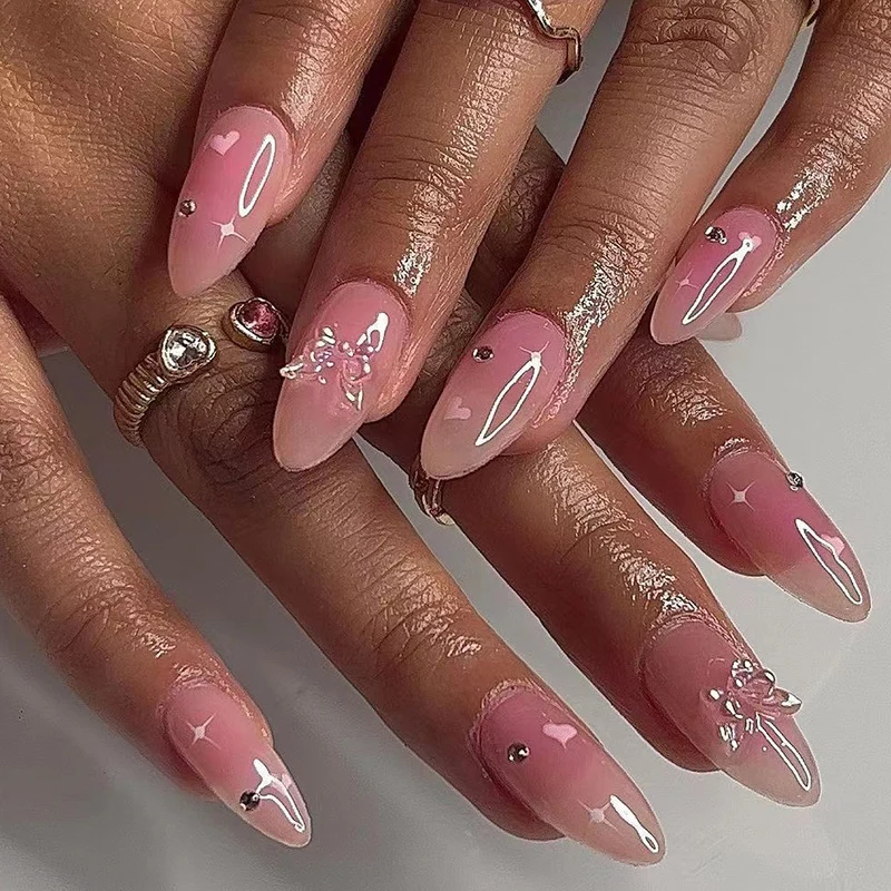 Artful nail art with heart motifs and glitter accents Stornfield