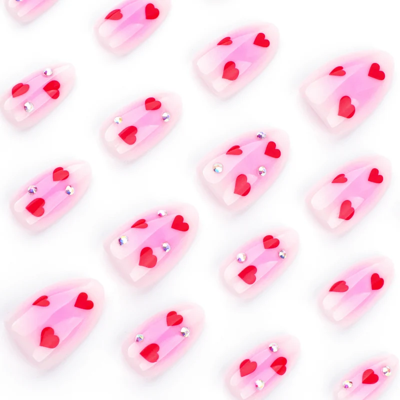 Artful nail art with heart motifs and glamorous details Stornfield
