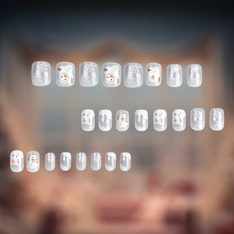 Artful Nail Art with Snow and Christmas Motifs Stornfield