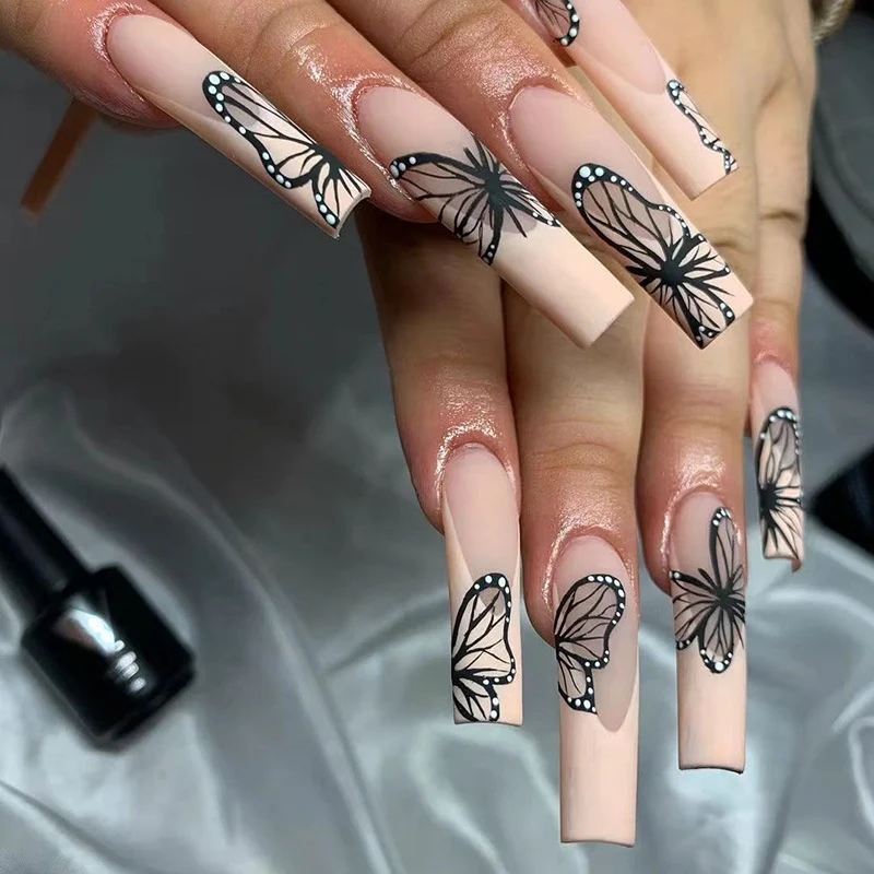 Artistic Nail Art with Butterfly Design Stornfield