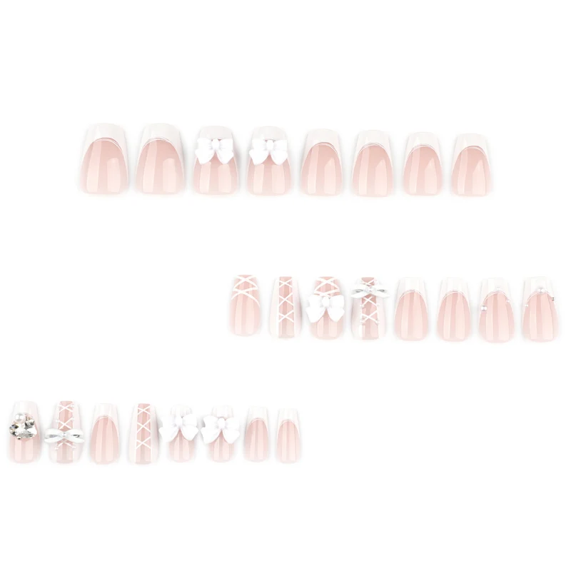 Artful Nail Art with Bows and Rhinestone Decorations Stornfield