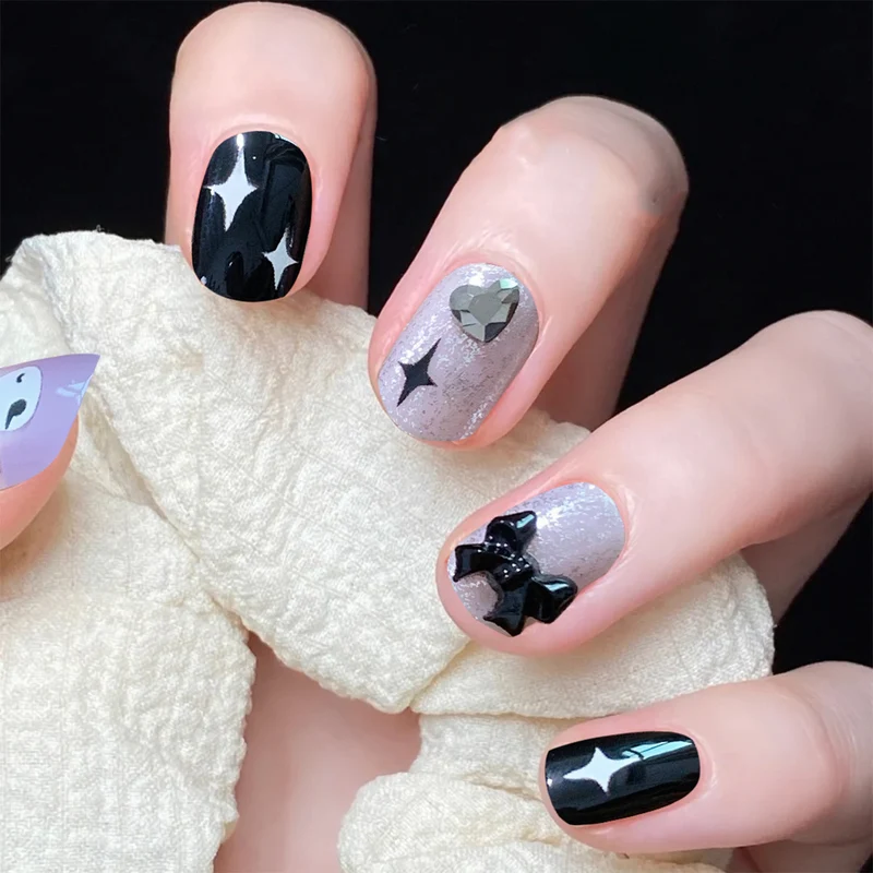 Artful Nail Art with Bow and Heart Design Stornfield