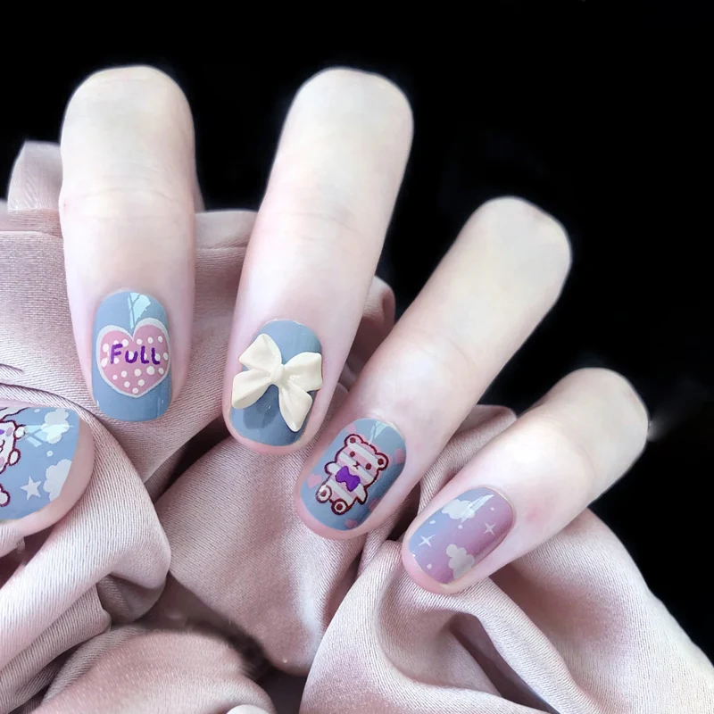 Artful Nail Art with Bow and Heart Design Stornfield