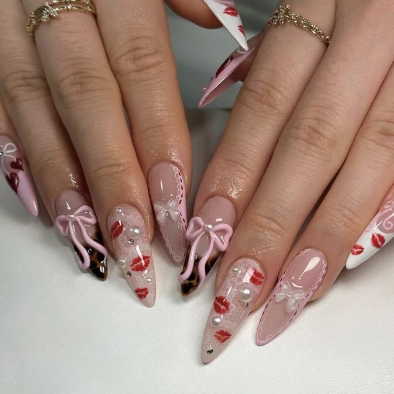 Artful Nail Art with Romantic Heart and Bow Motif Stornfield