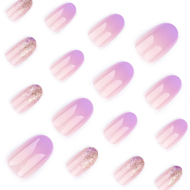 Artful nail art with ombre design and glitter accents Stornfield