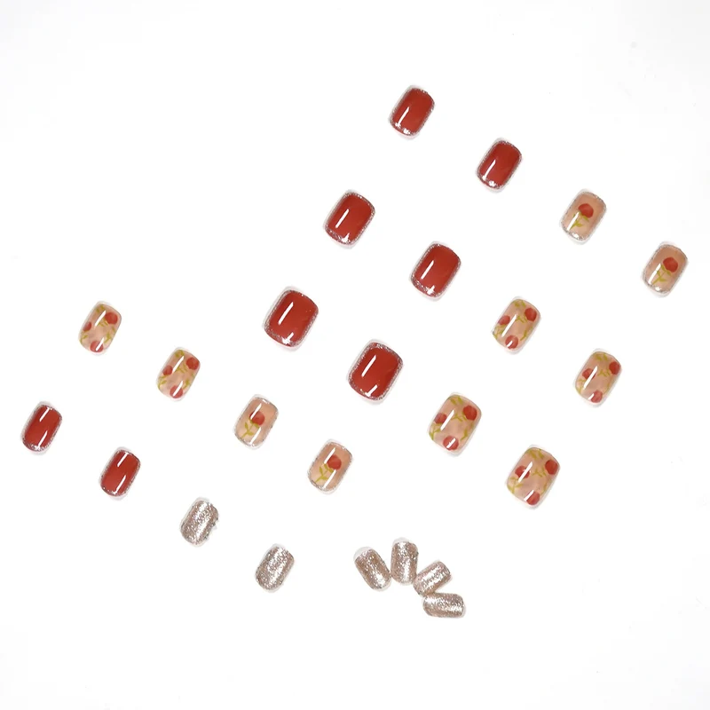 Artful nail art with natural gradient and floral accents Stornfield