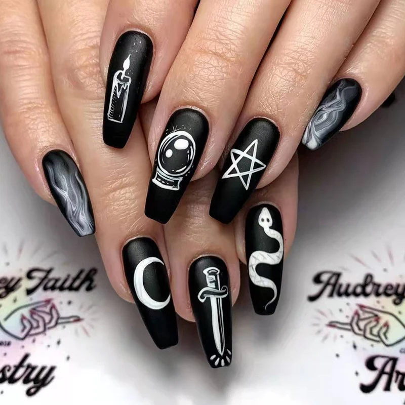 Artful nail art with mystical motifs Stornfield