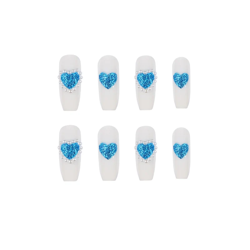 Artful nail art with heart-shaped accents Stornfield
