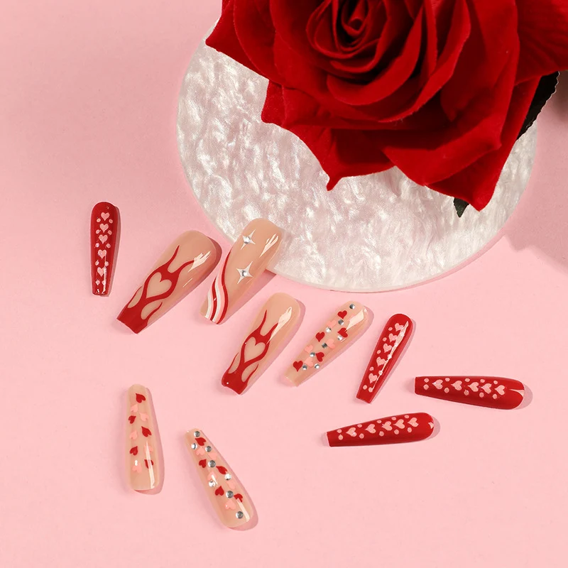 Artful Nail Art with Hearts and Glitter Accents Stornfield