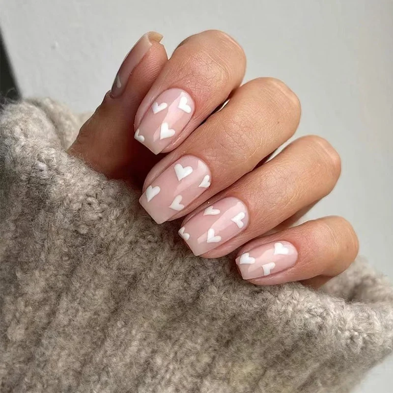 Artistic Nail Art with Heart Motif Stornfield