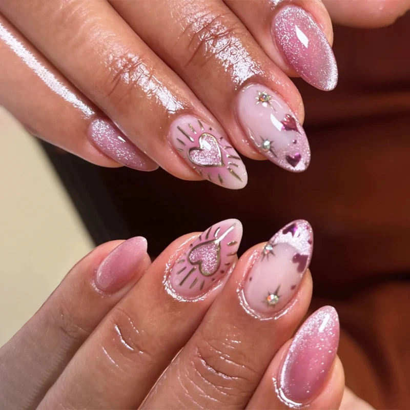 Artful Nail Art with Heart Design and Glitter Stornfield