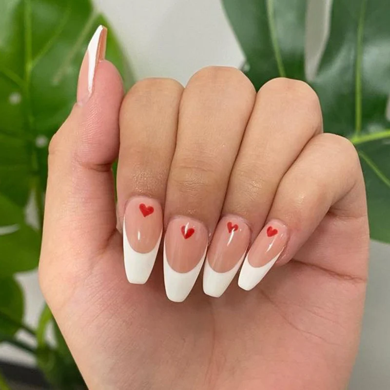 Artistic Nail Art with Heart Accents Stornfield