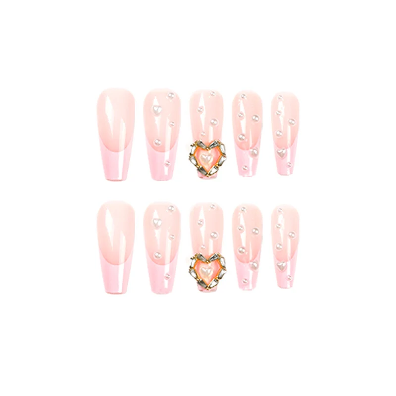 Artistic nail art with heart and pearl accents Stornfield
