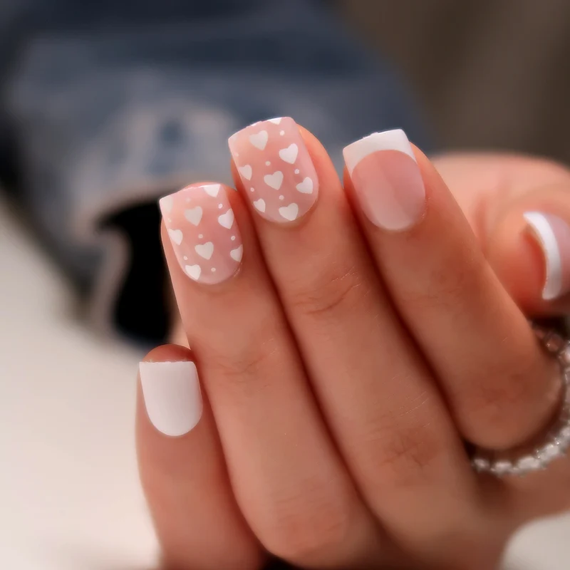 Artistic Nail Art with Heart Pattern Stornfield