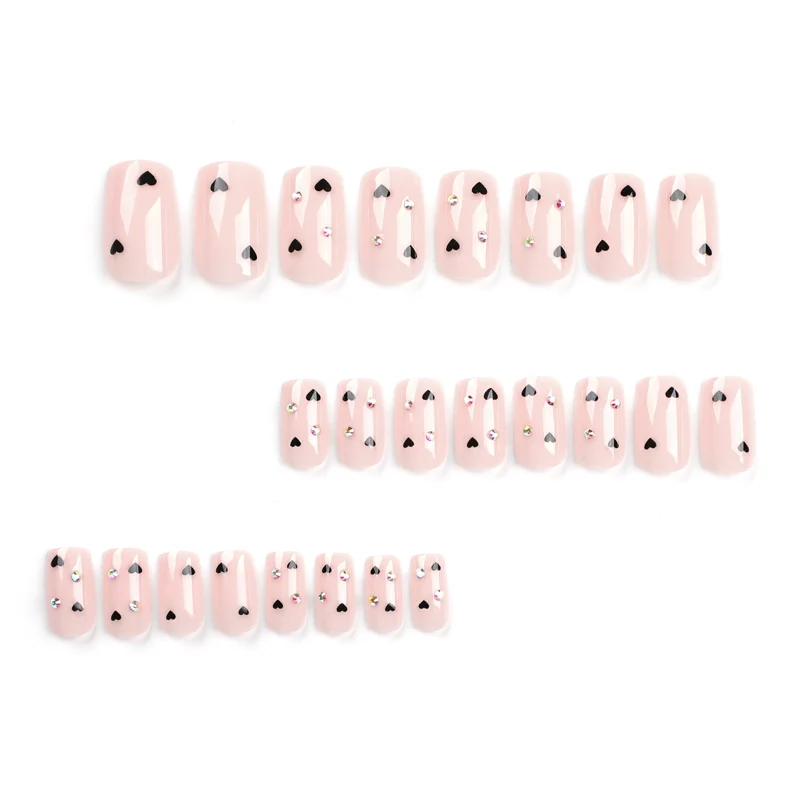 Artistic nail art with heart design and glitter accents Stornfield