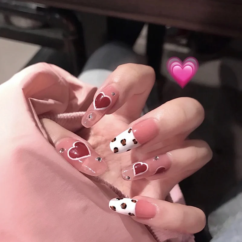 Artistic Nail Art with Heart Design Stornfield