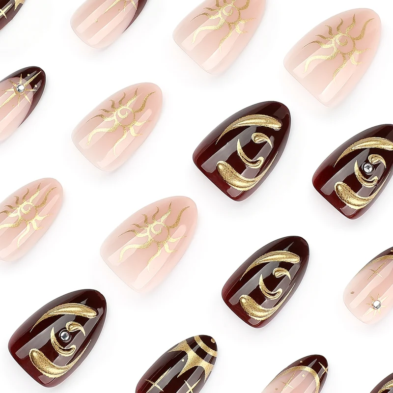 Artful nail art with golden accents and mystical motifs Stornfield
