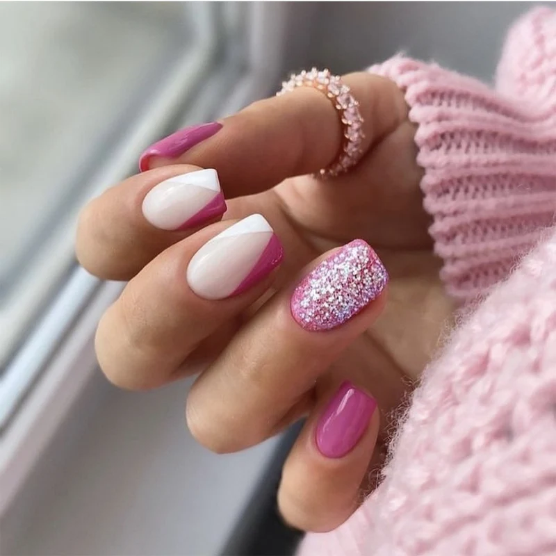 Artistic Nail Art with Glitter Accents and Ombre Design Stornfield