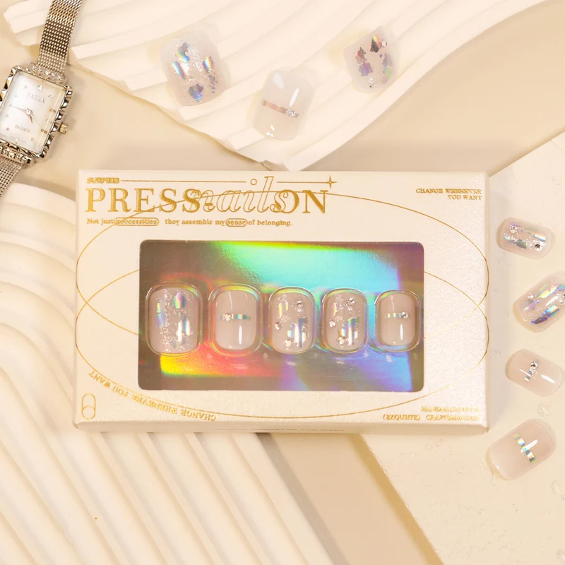 Artful Nail Art with Glitter Accents and Elegant Details Stornfield