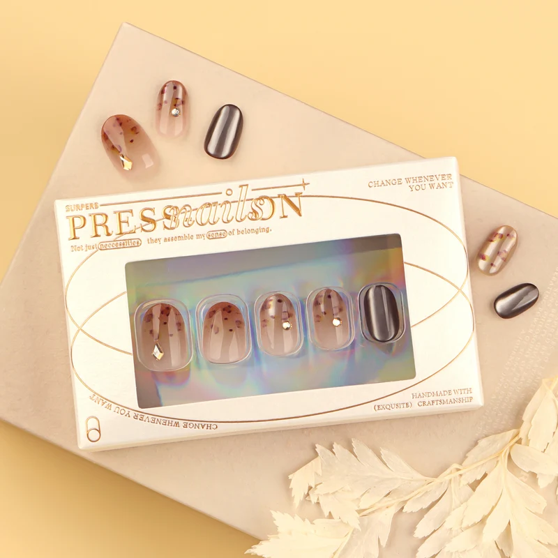 Artistic nail art with glitter accents and elegant design Stornfield