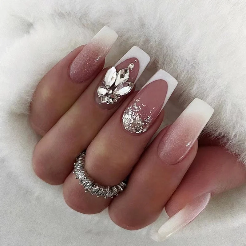 Artful Nail Art with Glitter and Jewelry Details Stornfield