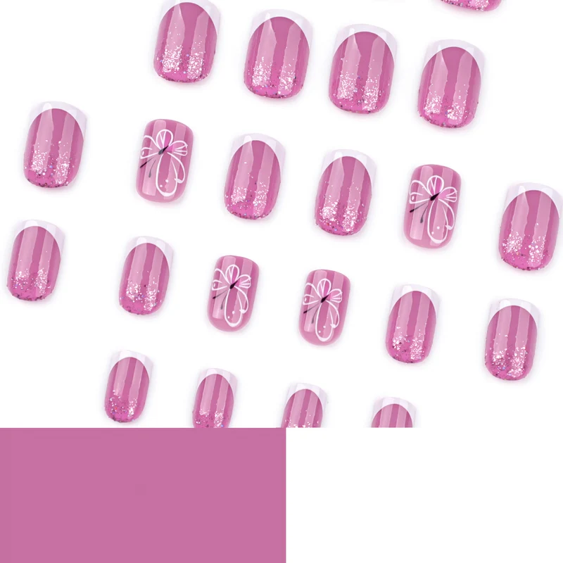 Artistic nail art with glitter and butterfly design Stornfield