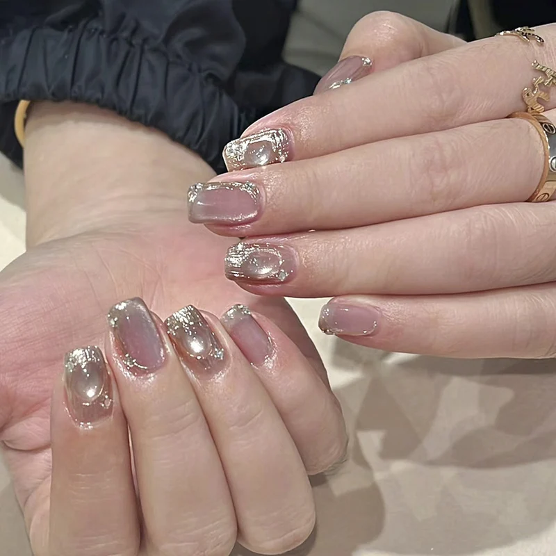 Artistic Nail Art with Glitter and Ombre Effect Stornfield