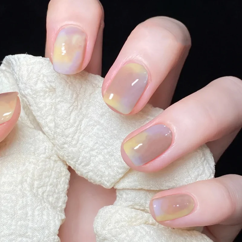 Artful Nail Art with Glitter and Ombre Design Stornfield