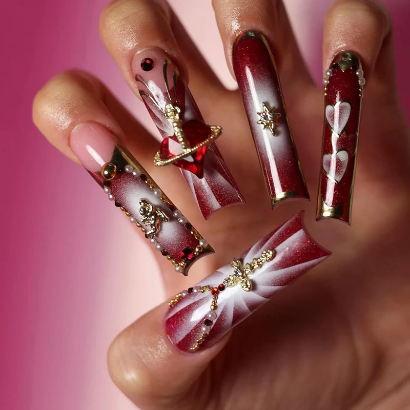 Artistic Nail Art with Glitter and Heart Designs Stornfield