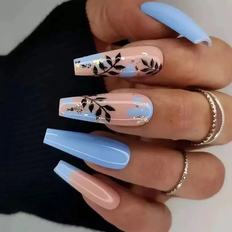 Artful Nail Art with Floral Designs and Glitter Stornfield