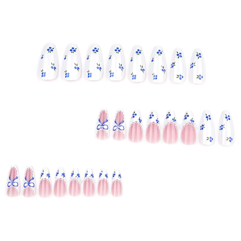 Artful nail art with floral accents and bow embellishment Stornfield