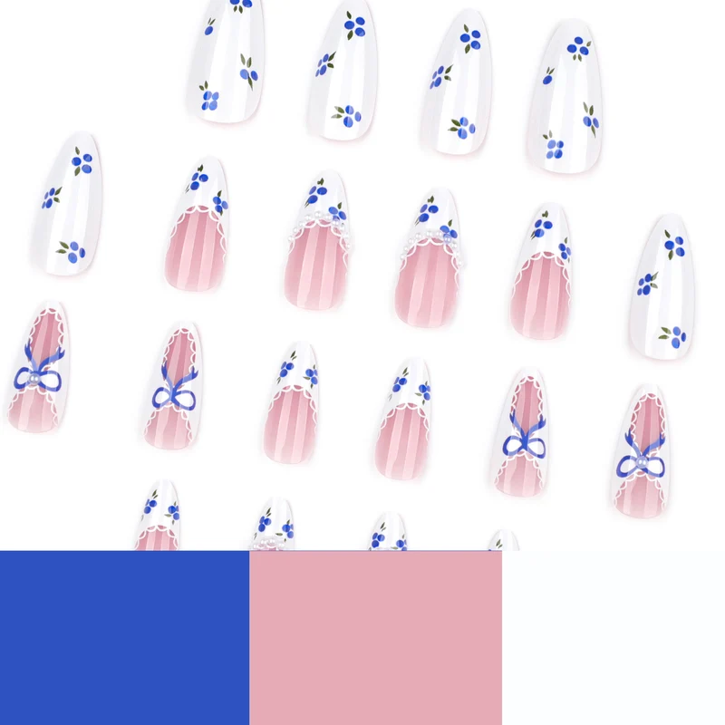 Artful nail art with floral accents and bow embellishment Stornfield