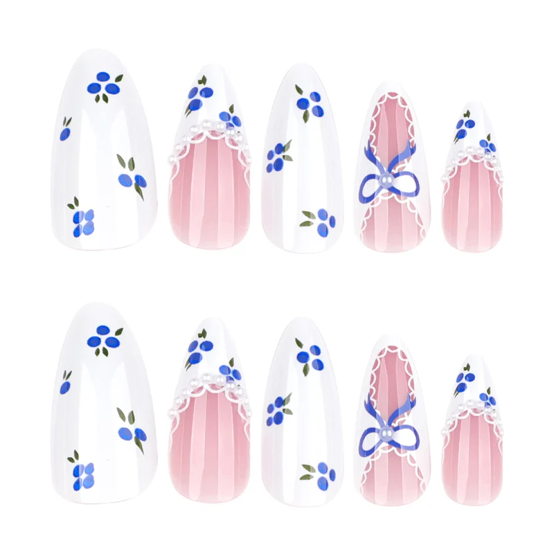 Artful nail art with floral accents and bow embellishment Stornfield