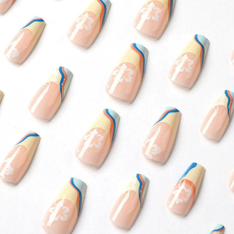 Artistic nail art with floral accents and creative color layers Stornfield