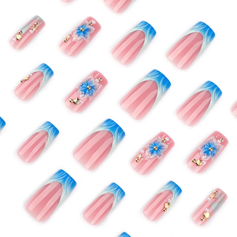 Artful nail art with floral accents and glitter effects Stornfield