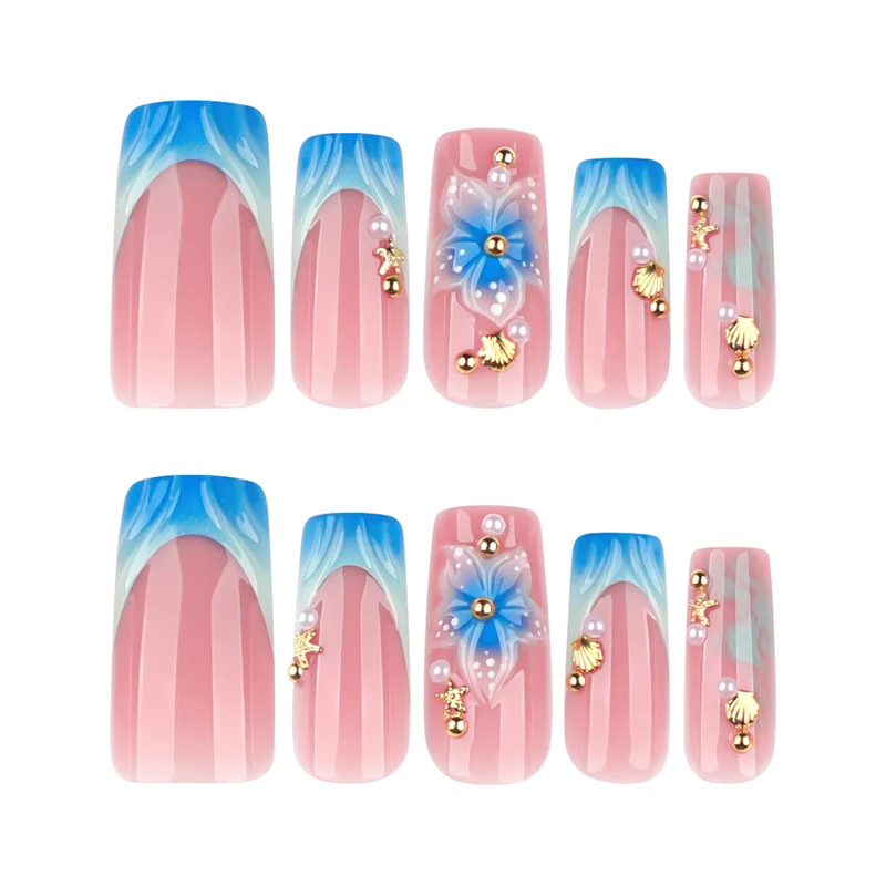 Artful nail art with floral accents and glitter effects Stornfield