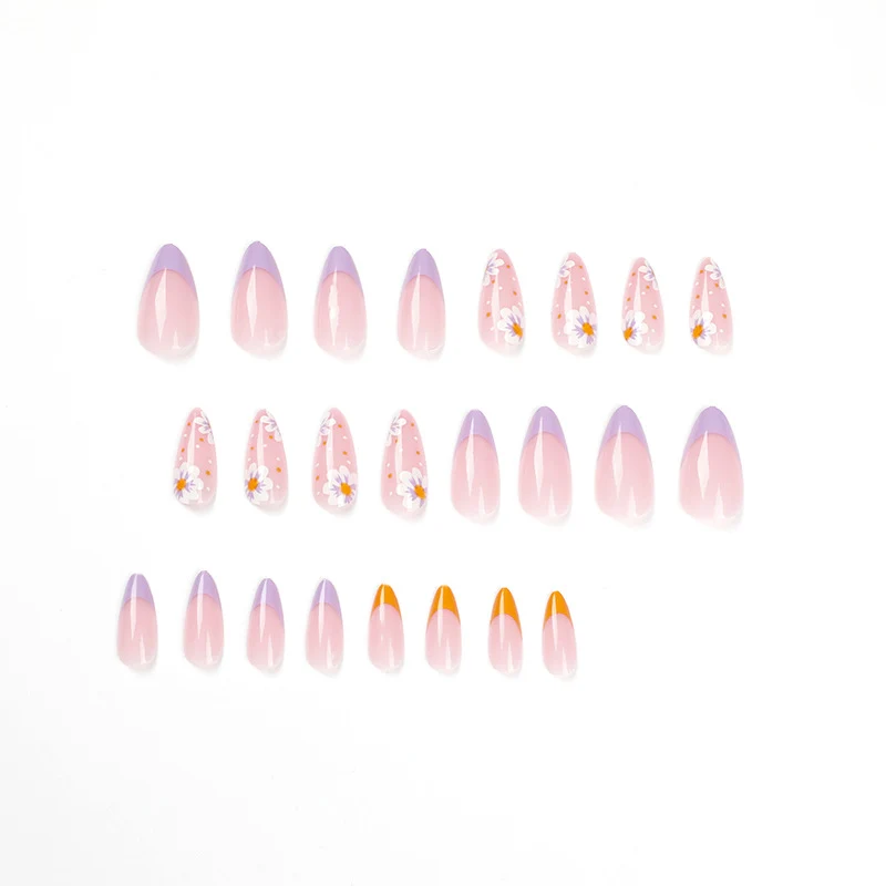 Artful nail art with floral accents and gradient colors Stornfield