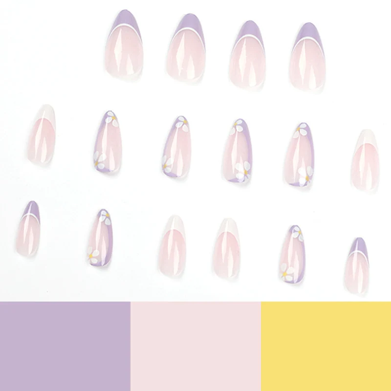 Artful nail art with floral accents and gradient colors Stornfield