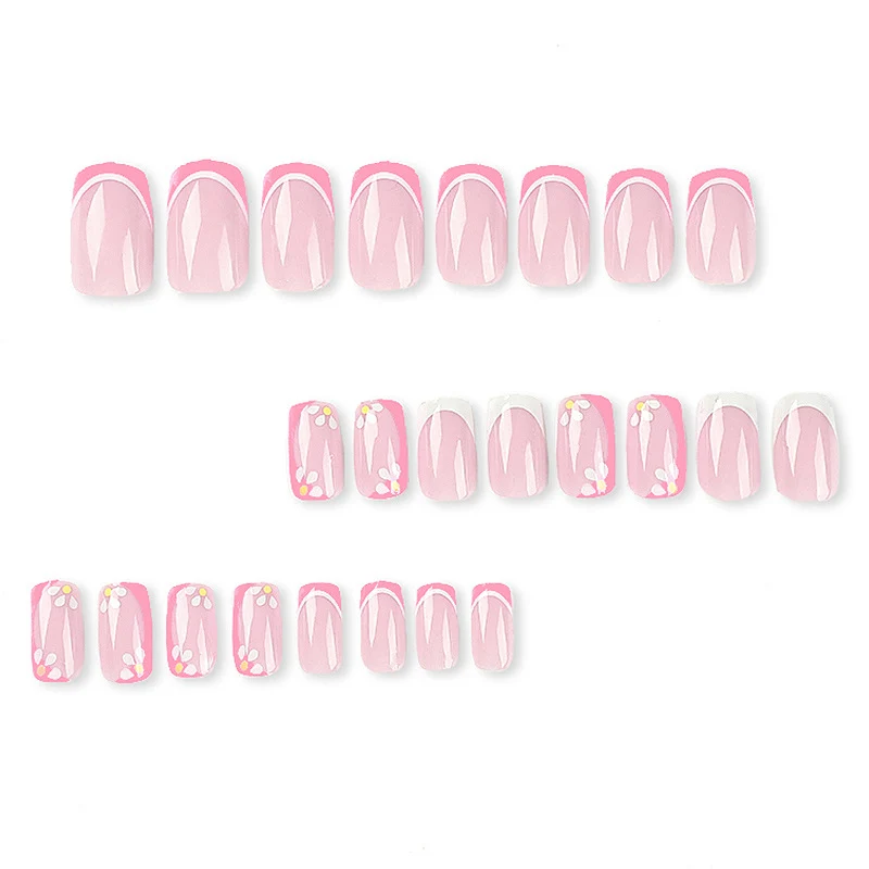Artistic nail art with floral design and glitter accents Stornfield