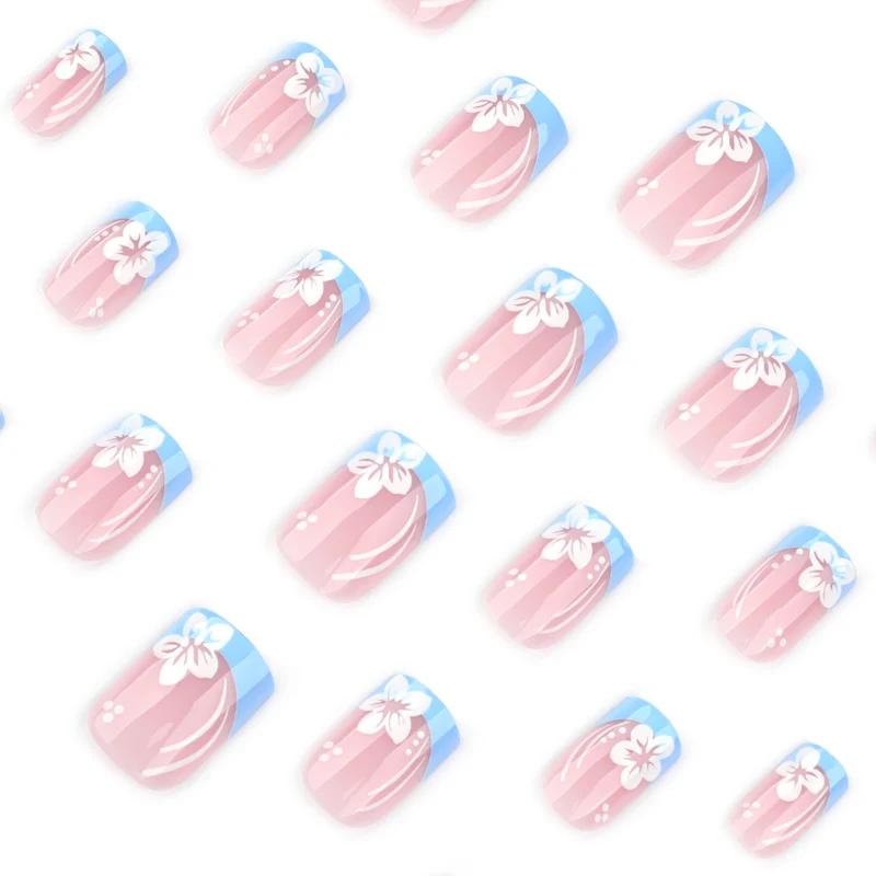 Artistic Nail Art with Floral Design and Elegant French Tip Finish Stornfield
