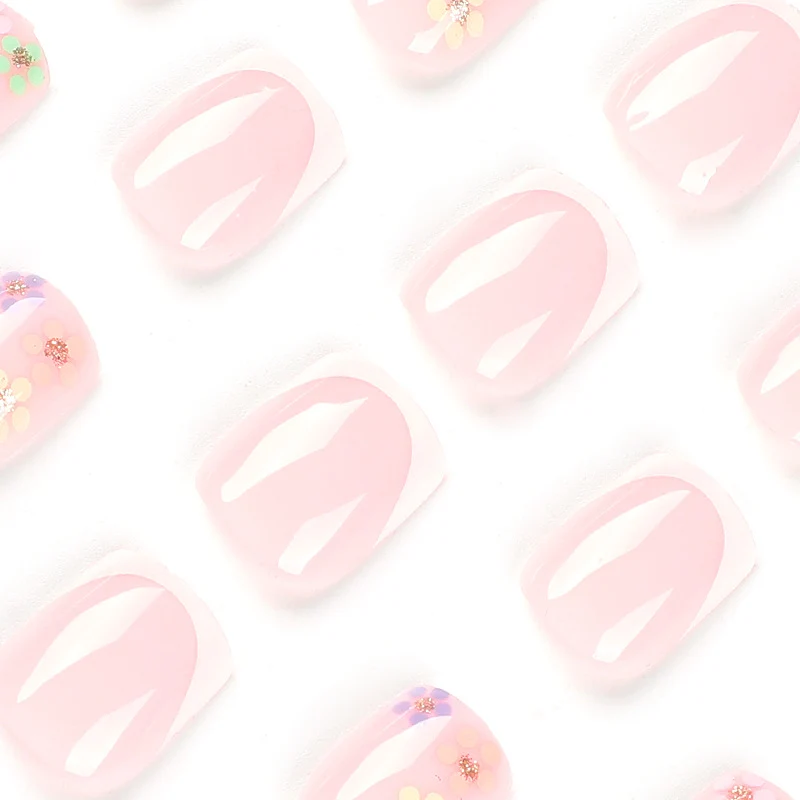 Artistic nail art with floral accent and elegant French tip Stornfield