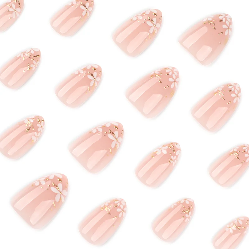 Artful nail art with floral design and glitter accents Stornfield