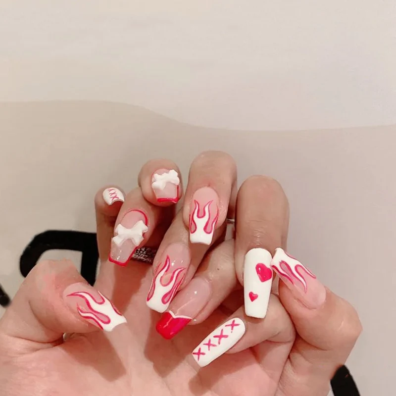 Artful Nail Art with Fire and Heart Designs Stornfield