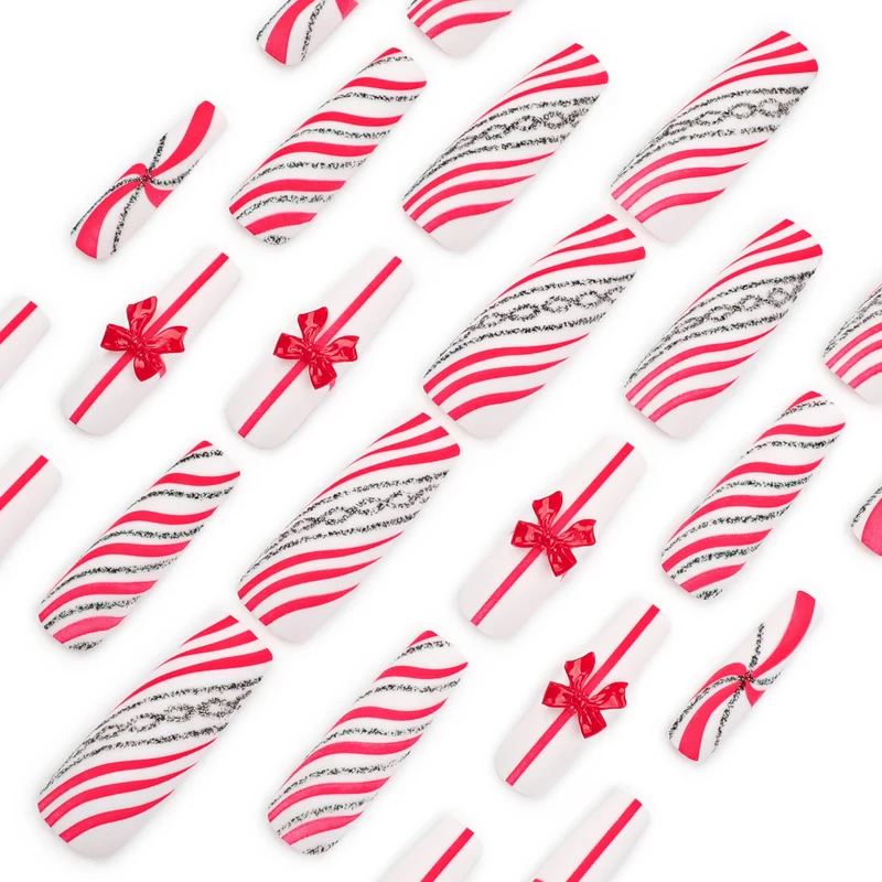 Artful Nail Art with Festive Bows and Christmas Motifs Stornfield